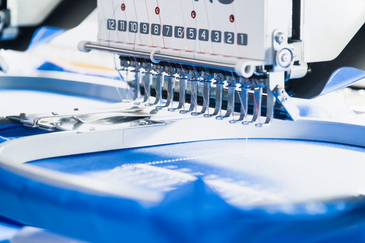 Computerized embroidery machine.  Digital textile industry.